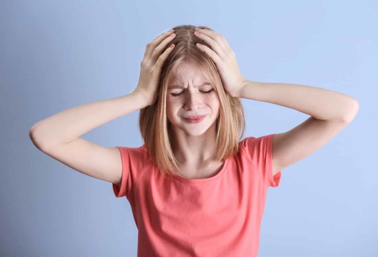 Anzeichen für Migräne bei Kindern: Erschöpfung und Stimmungsschwankungen